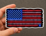 Neon Flag Sticker | Glowing American Flag Decal | Waterproof Vinyl — real sticker held in hand